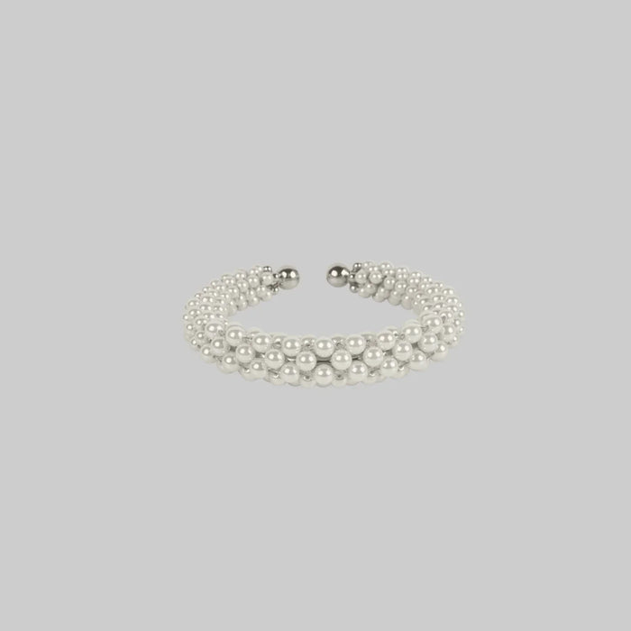 handcrafted modular beaded wrist bracelet with polymer metal beads with silver coated and synthetic
japanese pearl by object and dawn side view