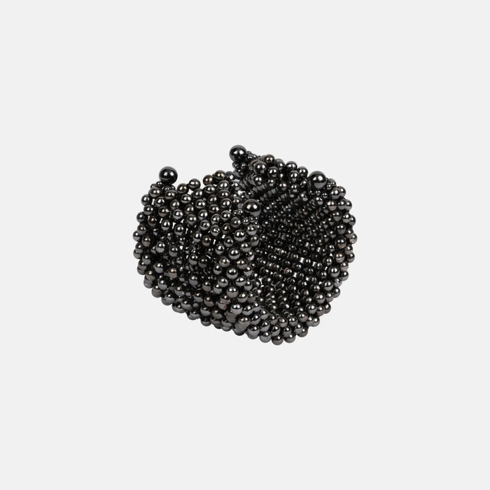 handcrafted polymer metal beads grey Khutulun 4D Supple Cuff from object and dawn diagonal view ghost image