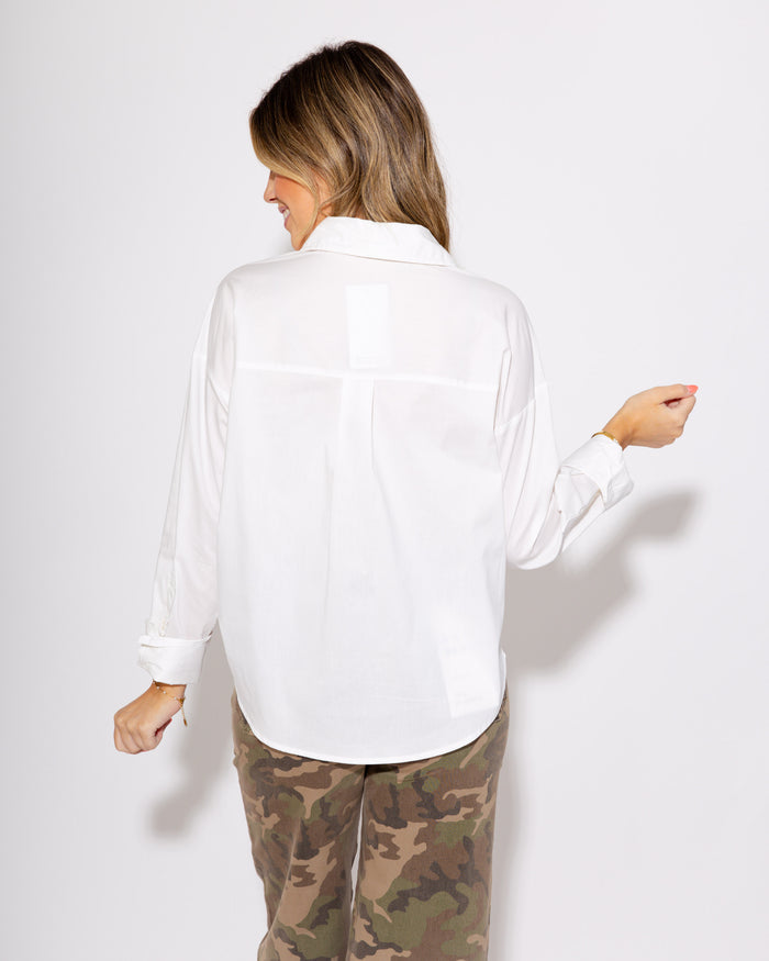 A Classic White Button Up Top