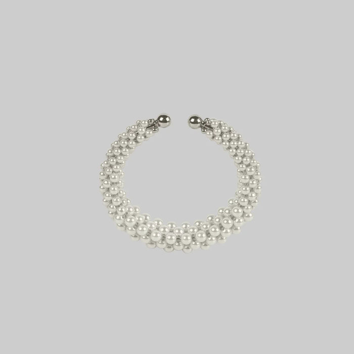 handcrafted modular beaded wrist bracelet with polymer metal beads with silver coated and synthetic
 japanese pearl by object and dawn
