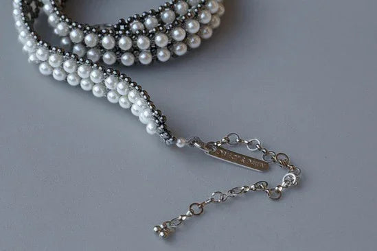 Handmade beaded polymer metal beads with syntethic japanese beads by object and dawn close up by object and dawn