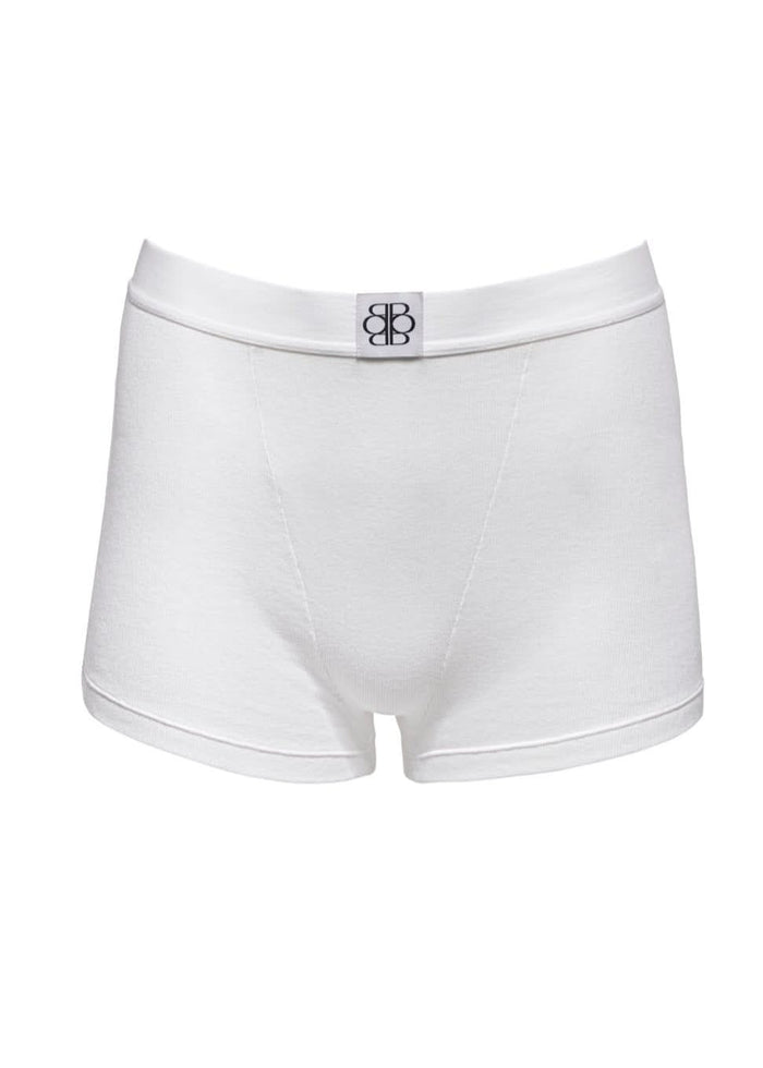 White boy shorts with a Bumpsuit logo on a white background