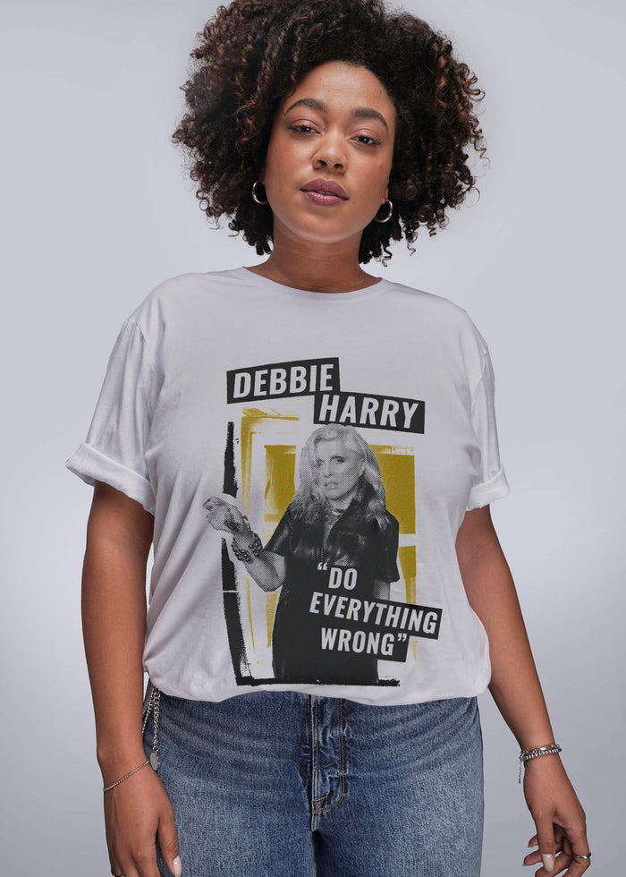 1X=Person wearing a t-shirt with a graphic design featuring Debbie Harry and text.