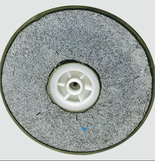 Round grinding wheel with a white center on a light gray background