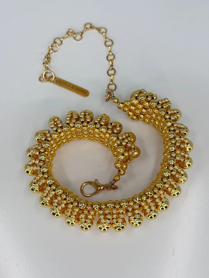 ghost image optical 3d choker in 22k gold wash by object & dawn in white background