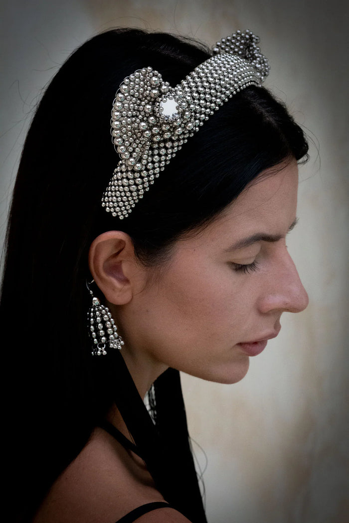 Object & Dawn Beaded Jas Headband silver with 11" taseels silver-black worn by woman in neutral background