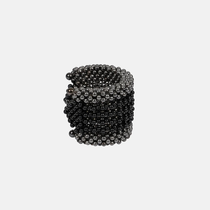 polymer metal beads grey with black crystal Khutulun 4D Supple Cuff from object and dawn side view ghost image