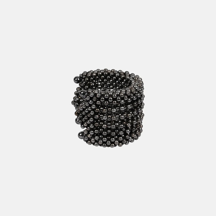 handcrafted polymer metal beads grey Khutulun 4D Supple Cuff from object and dawn side view ghost image