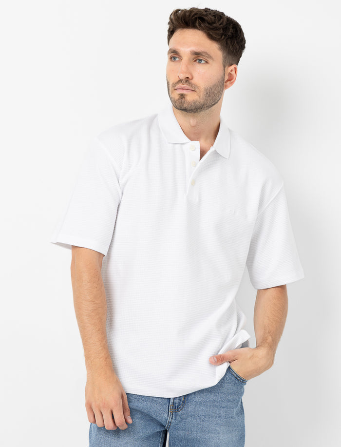 Polo en tricot texturé