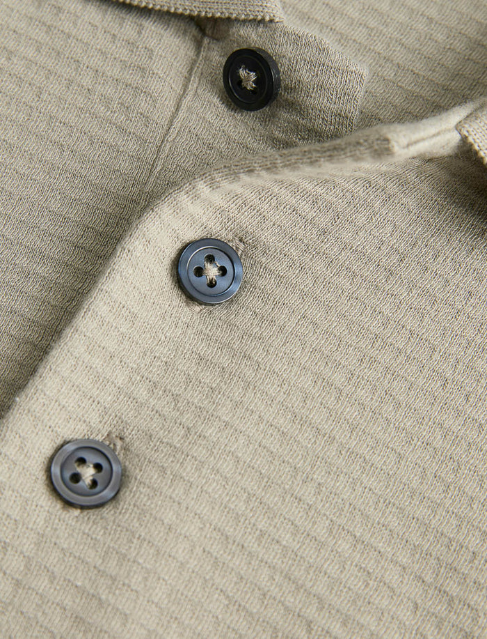 Polo en tricot texturé