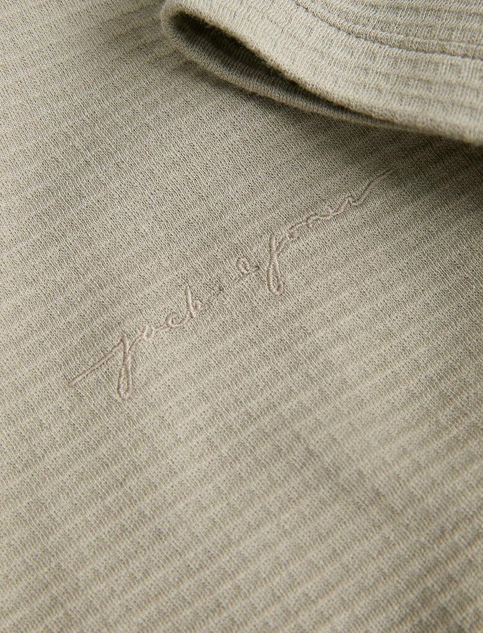Polo en tricot texturé