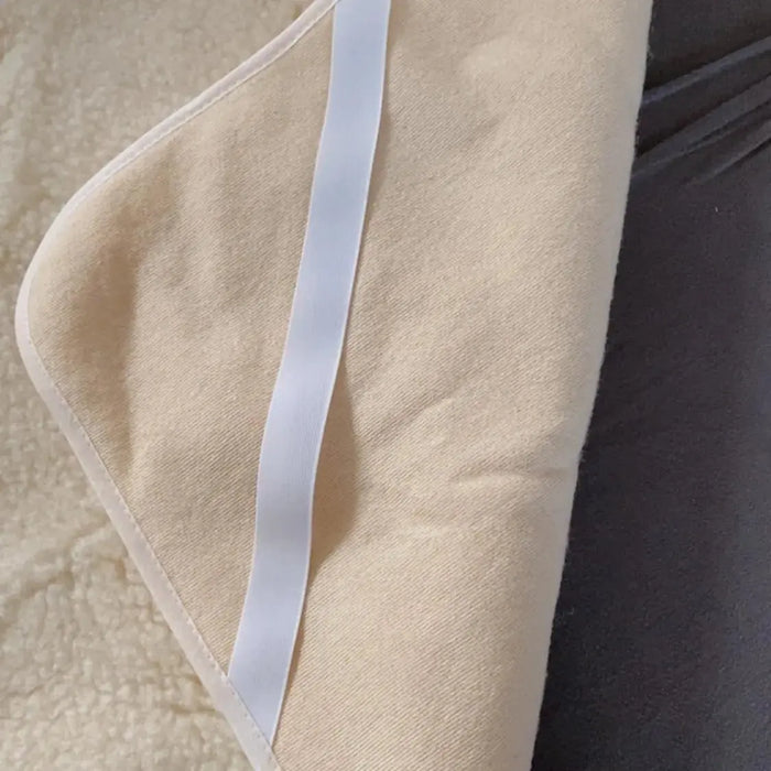 Protège matelas en laine vierge Sassoupi - 70x140cm
