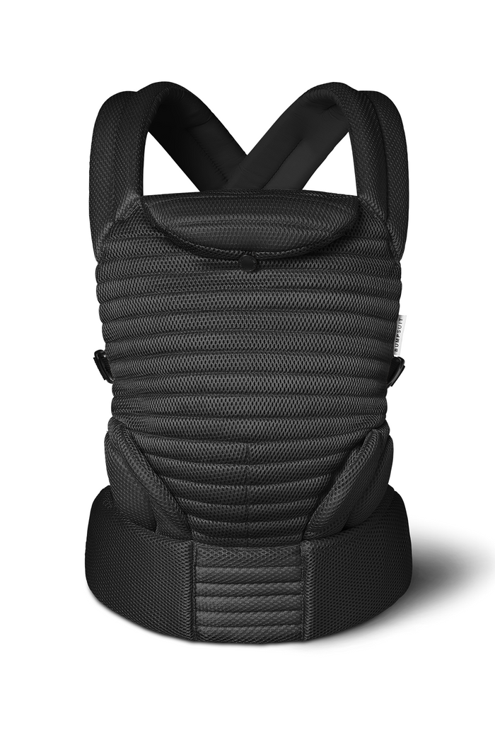 The Bumpsuit black mesh armadillo baby carrier from a front view, shot against a white background.