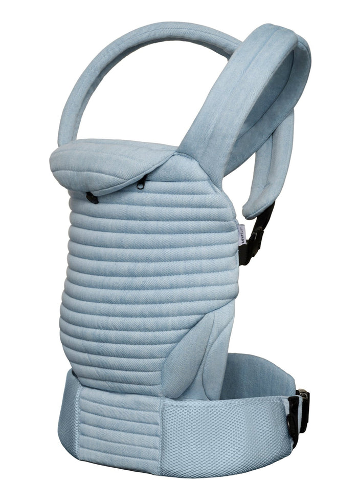 armadillo baby carrier side view in light denim on white background
