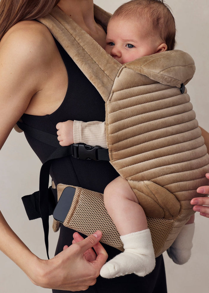 the armadillo baby carrier in dune velvet