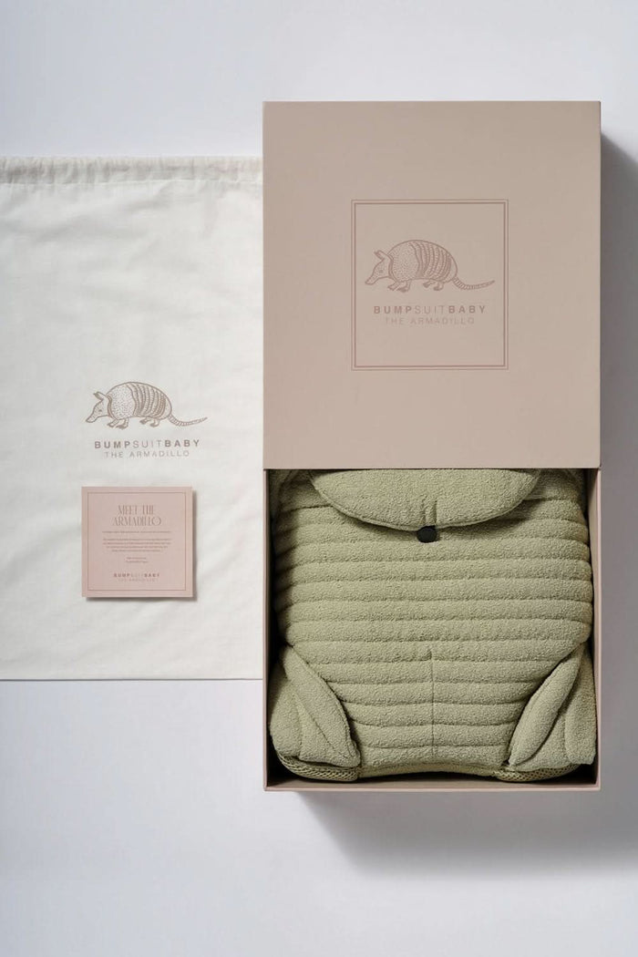 Bumpsuit Maternity the Armadillo Baby Carrier in Matcha green in a box with bag