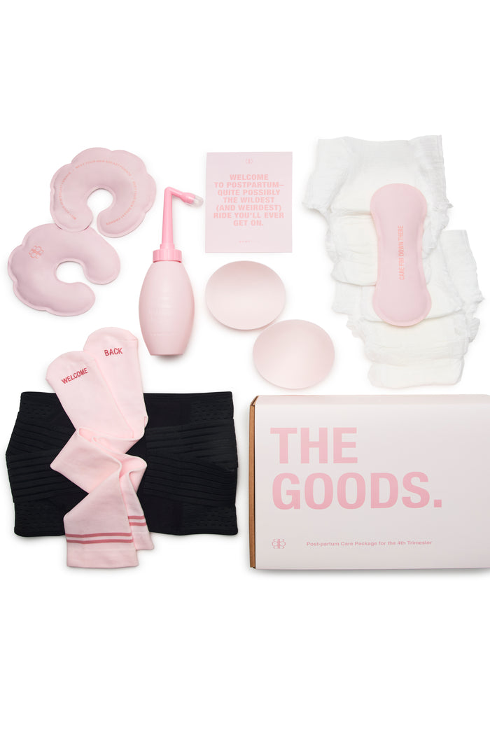Collection of women's post-partum care products including a peri spray bottle, socks, adult diapers, nipple covers, heat packs support waist trainer and a box labeled 'The Goods' on a white background.
