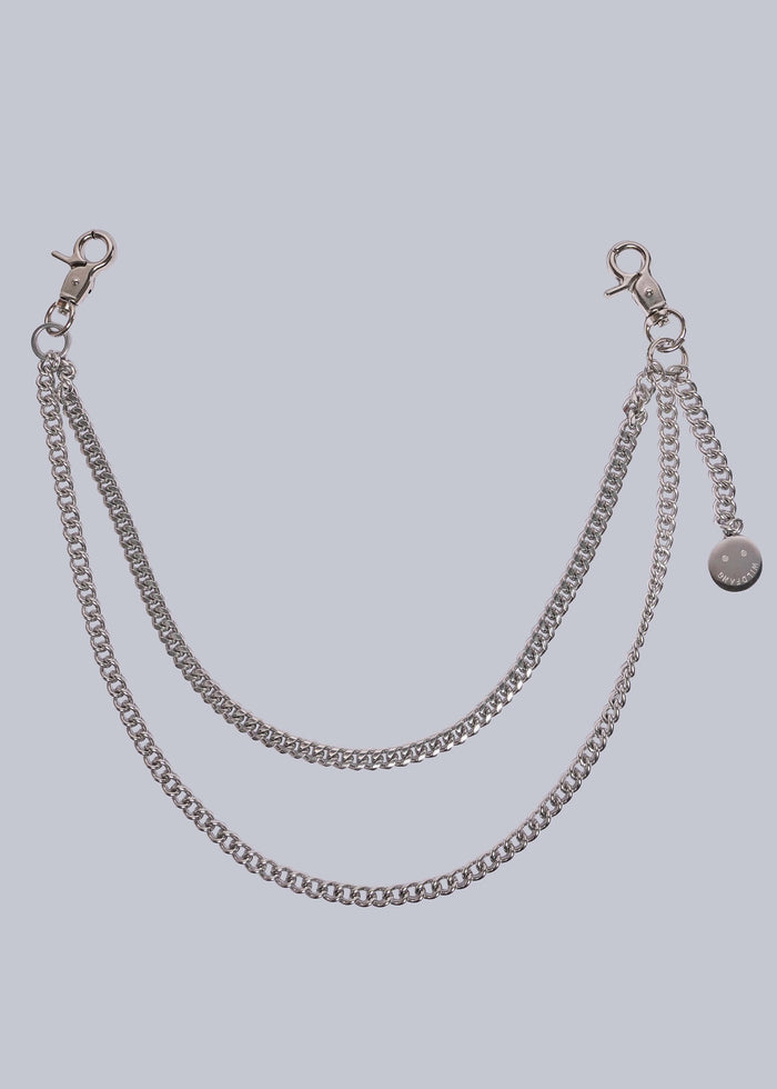 Silver chain accessory on a light gray background